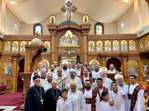 Photo with the parish clergy and deacons.